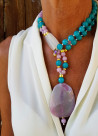 Long necklace of natural stones with agate pendant
