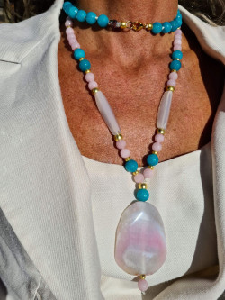 Long necklace of natural stones with agate pendant