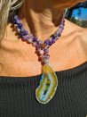 Long necklace of purple agates and crystallized agate pendant