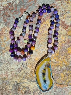 Long necklace of purple agates and crystallized agate pendant