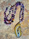 Long necklace of purple agates and crystallized agate pendant