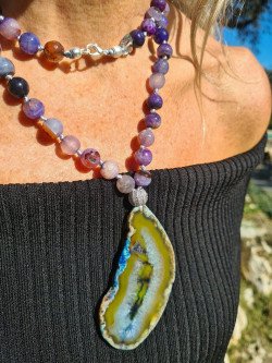 Long necklace of purple agates and crystallized agate pendant