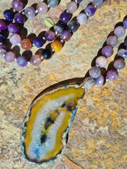 Long necklace of purple agates and crystallized agate pendant