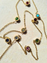 Steel chain with colorful cubic zirconia circles